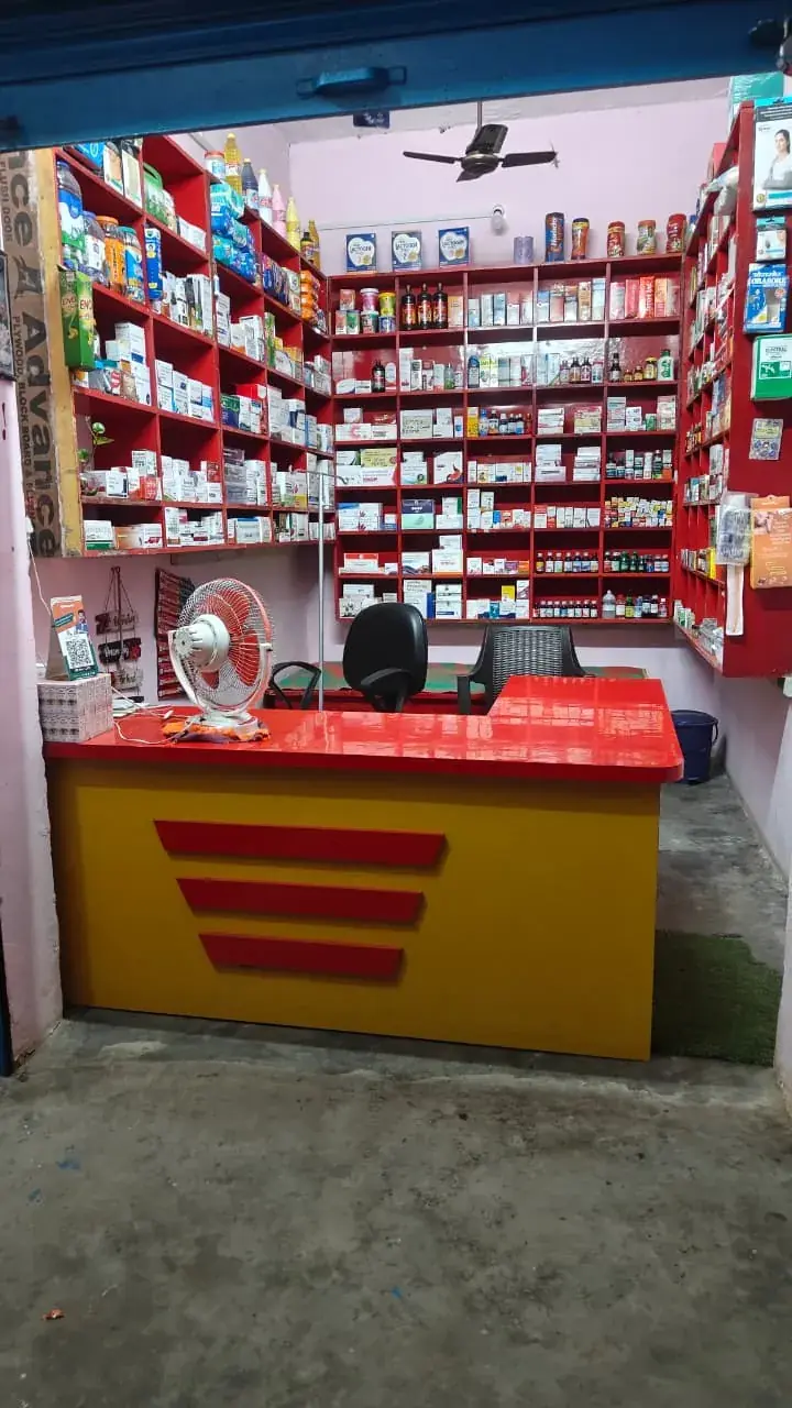 Sneha Pharmacy's red and yellow counter